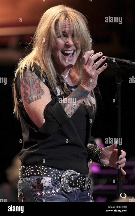 lita ford tattoos|lita ford boyfriend.